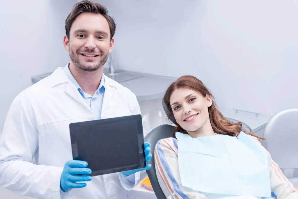 Smiling patient with the best dentist in Bethesda for comfortable treatment