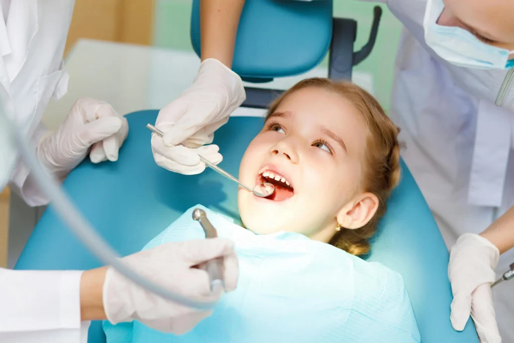 Family and girl visiting a dentist for kids in North Bethesda, MD.